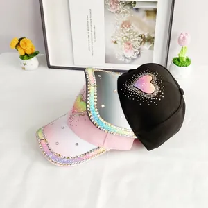 Women's gradient baseball caps with rhinestone heart detail in pink, grey and black