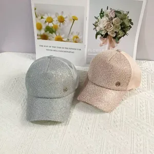 Lace baseball caps for women with shimmering sequins and metal logo in silver and pink