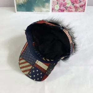 Detail view of the baseball cap interior with US flag print and top wig attachment
