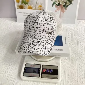 Detailed view of breathable hollow mesh baseball cap weighing approximately 82g on a scale