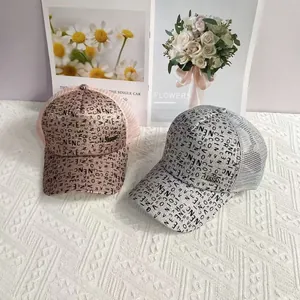 Glittery graffiti letters baseball caps with mesh back in pink and silver grey