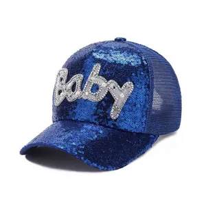 Close-up of baby letter sequins on blue mesh breathable snapback baseball cap