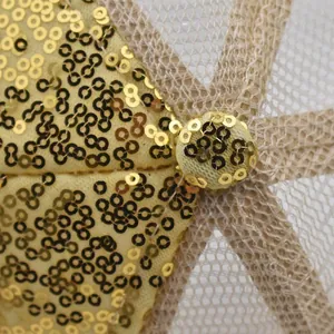 Close-up of golden sequins and breathable mesh fabric on a stylish baseball cap