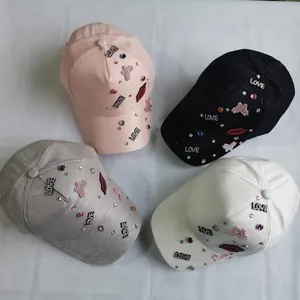 Fashion baseball caps in pink black grey and white with rhinestone LOVE and red lip designs