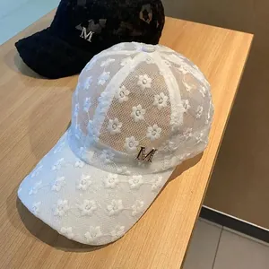 Lace floral baseball cap for women with M metal logo in black and white colors