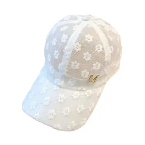 White lace floral baseball cap with breathable mesh and golden M letter emblem