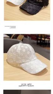 Detail of floral lace embroidery and breathable mesh on white and black baseball caps
