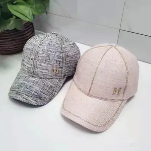 Fashionable tweed baseball caps with rhinestone M logo and gold chain trim in two colors