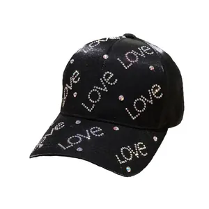 Women's black baseball cap with sparkling rhinestone Love lettering and curved brim