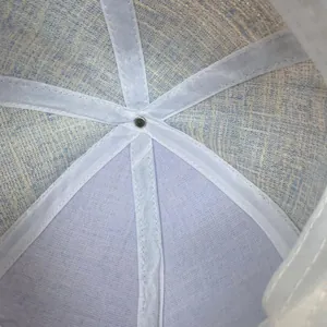 Detailed interior of the baseball cap showing stitching, fabric texture, and white reinforcement tape
