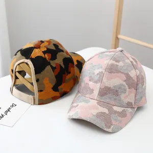 Camo knit baseball cap with high ponytail criss-cross back and warm fleece lining