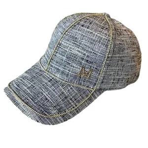 Chic tweed baseball cap in grey-white with golden M logo and metallic chain trim details