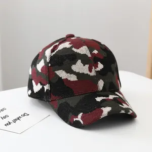 Macro detail of camouflage knit texture and curved brim of this warm winter baseball cap