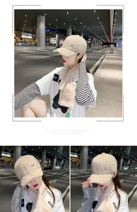 Détail de la casquette beige en fausse fourrure avec logo M et écharpe en peluche assortie
