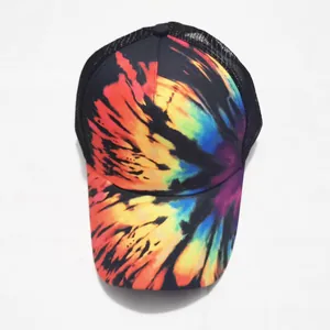 Detailed view of tie-dye printed canvas crown and breathable black mesh on back of hat