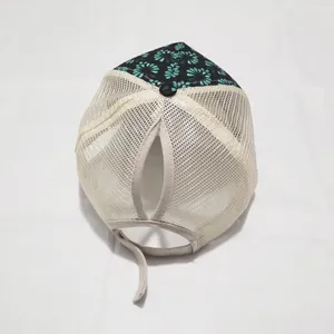 Detail of the ponytail hole and breathable mesh on the floral printed ponytail baseball cap