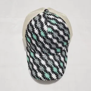 Detail view of the breathable mesh back and geometric pattern on the baseball cap