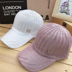 Breathable knitted baseball cap with M logo in pink and white for summer sun protection