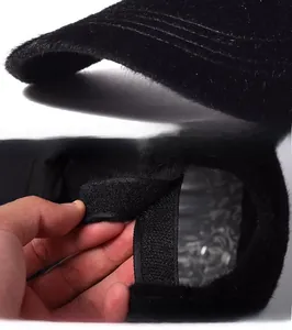 Detail of black mohair baseball cap featuring a curved brim and adjustable strap back