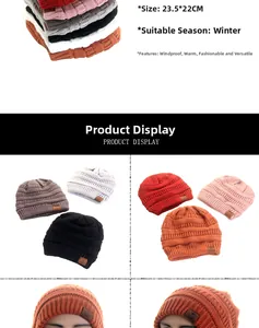 Detail view of colorful star knit beanies showing texture and 23.5x22cm dimensions