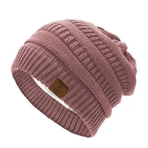 Pink knit star beanie for women with warm fleece lining and cable knit texture