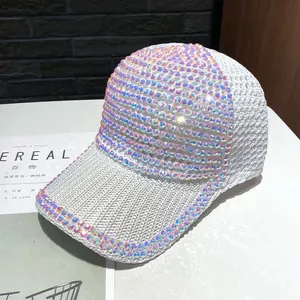 Close-up of white breathable baseball cap with iridescent AB rhinestones on the brim