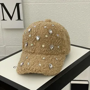 Macro view of light brown fleece baseball cap featuring elegant rhinestones decoration