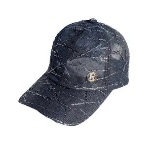 Sparkling dark blue baseball cap with metallic R-logo and breathable fabric for women