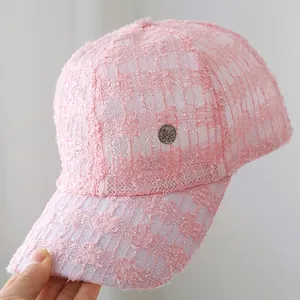 Elegant pink tweed baseball cap for women with silver metal buckle and shimmering finish