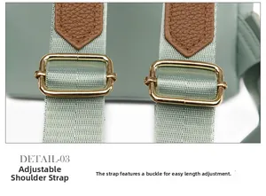 Detail of adjustable mint green strap with premium gold buckle and leather connector