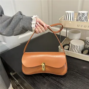 Minimalist vintage brown crescent shoulder bag with golden oval buckle clasp for women