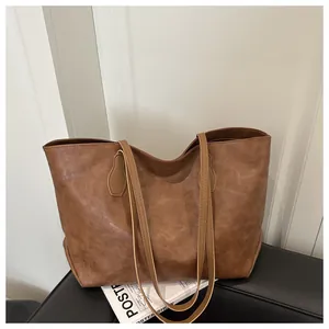 Vintage brown large capacity tote bag in faux leather with shoulder straps