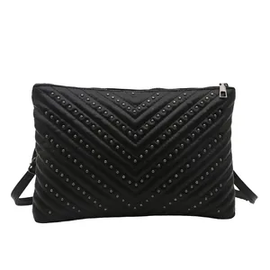 Black V-quilted faux leather shoulder bag with dark grey metallic studs decoration