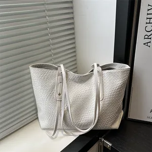 Minimalist white woven tote bag for women with large capacity and sleek shoulder straps