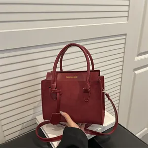 Elegant burgundy large-capacity tote bag with dual texture design and round handle