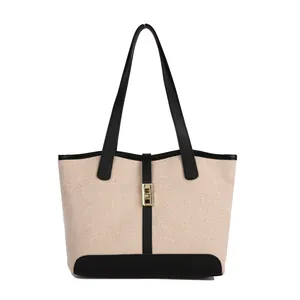 Sac fourre-tout minimaliste en toile pour femme avec bordures noires et fermoir doré