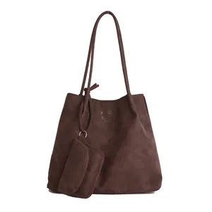 Dark brown matte tote bag with matching small coin pouch and long shoulder strap