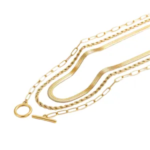Gold layered necklace set with paperclip, rope, snake chains and decorative OT toggle clasp