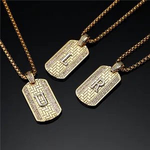 Hip hop style gold pendant necklace with square letter charms and pavé micro-zirconia