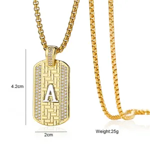 Golden dog tag necklace with letter A pendant and cubic zirconia showing 4.2cm height