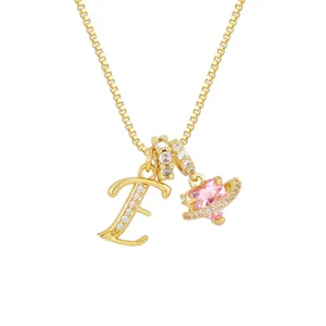 Pink heart planet pendant with letter E charm on golden box chain necklace