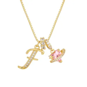 Golden box chain necklace featuring letter F pendant and pink heart zircon charm