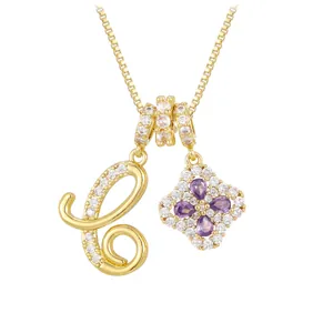 Gold necklace with letter C pendant and purple four-leaf clover zircon gemstone charm