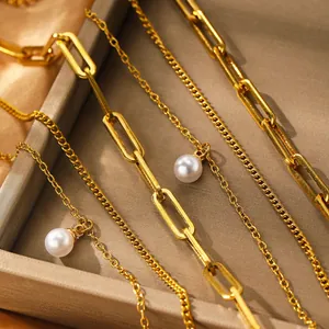 Triple layer stainless steel chain necklace with pearls on premium velvet display