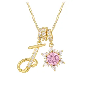 Golden box chain necklace with letter J charm and pink snowflake zircon pendant