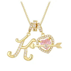 Golden heart necklace with letter K and pink zircon stone on venetian box chain