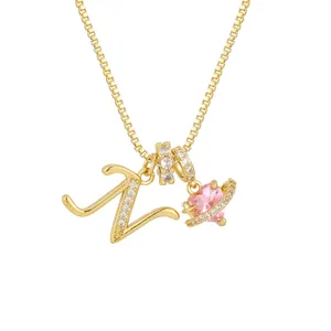 Golden box chain necklace with pink heart planet pendant and zircon letter V