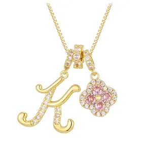 Gold box chain necklace with pink zircon clover and sparkling letter K pendant