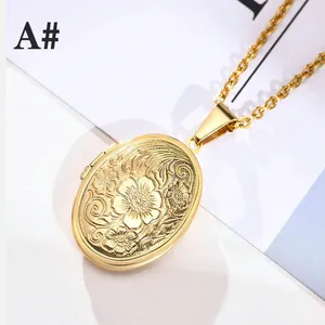 Vintage gold oval locket necklace with floral relief and delicate cable chain