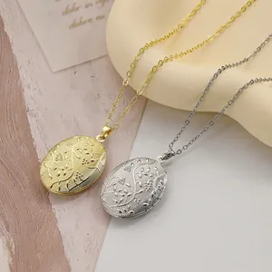 Detailed view of vintage gold and silver oval locket pendants with floral engravings